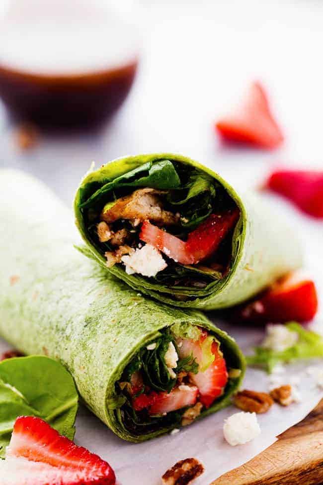 Strawberry Balsamic Chicken Salad Wrap cut in half to show what the inside looks like. 