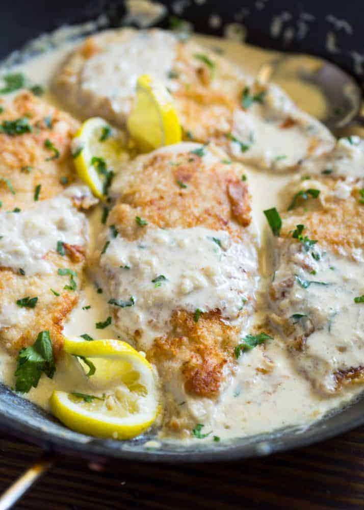 Creamy Lemon Garlic Chicken in a skillet. 