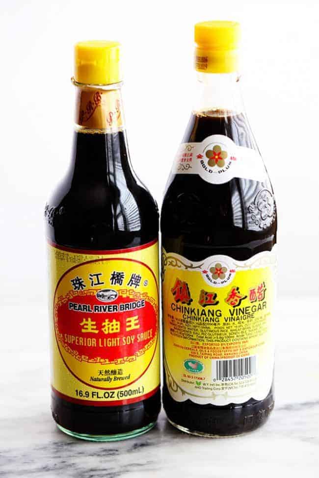 Two bottles of soy sauce. 