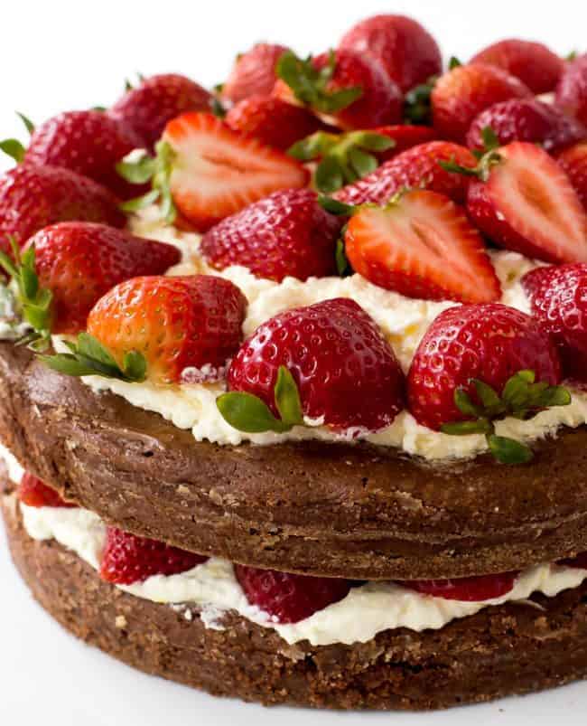 Brownie Strawberry Shortcake with fresh strawberries on the top and middle. 