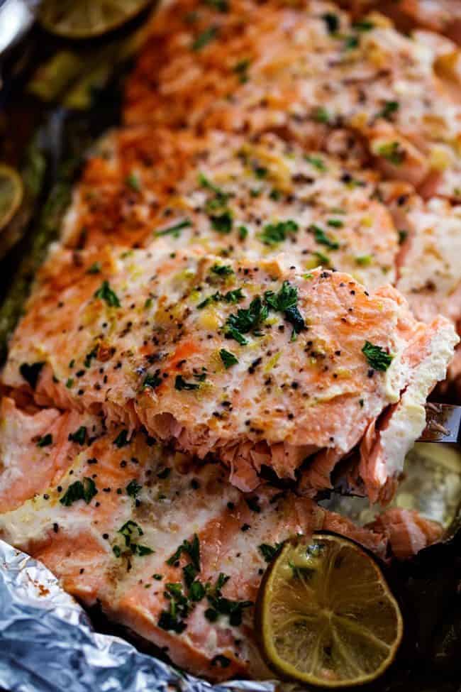 Buttery Garlic Lime Salmon with Asparagus with bit taken out of the salmon. 