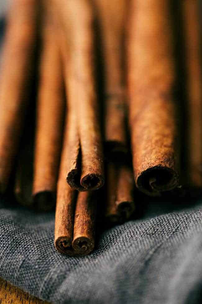 Cinnamon Sticks stacked on top of each other. 