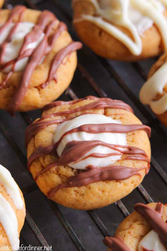 Up close photo of the Pumpkin Thumbprint Cookies on a cooling rack.