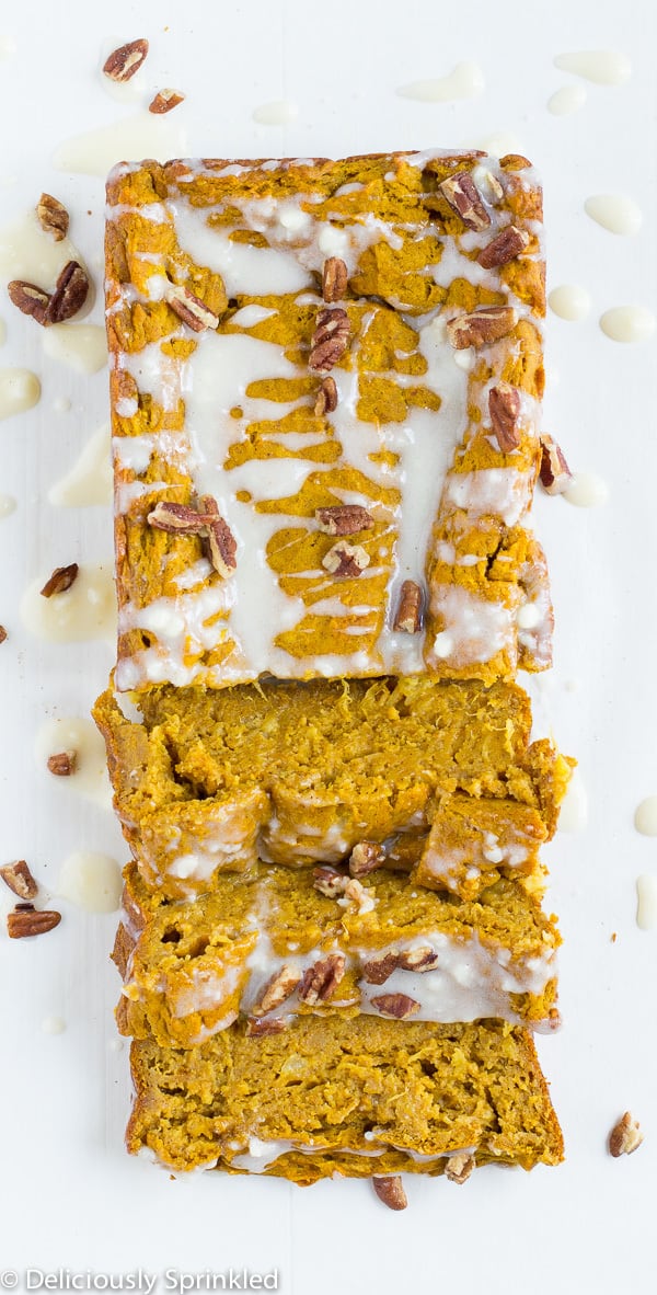 pumpkin sweet potato bread with three sliced pieces. 