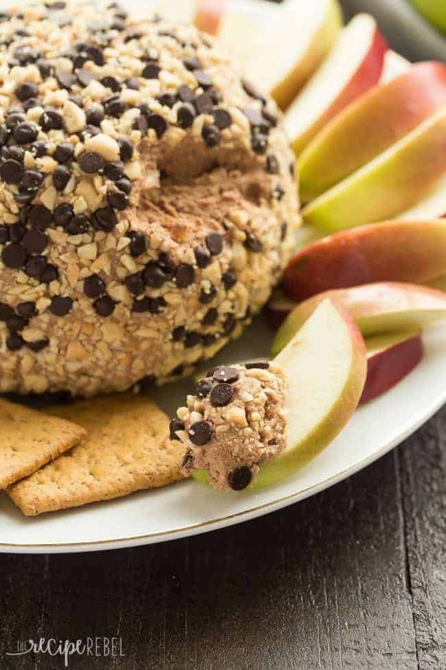 Up close photo of the snickers cheese ball with the bite taken out of it. 