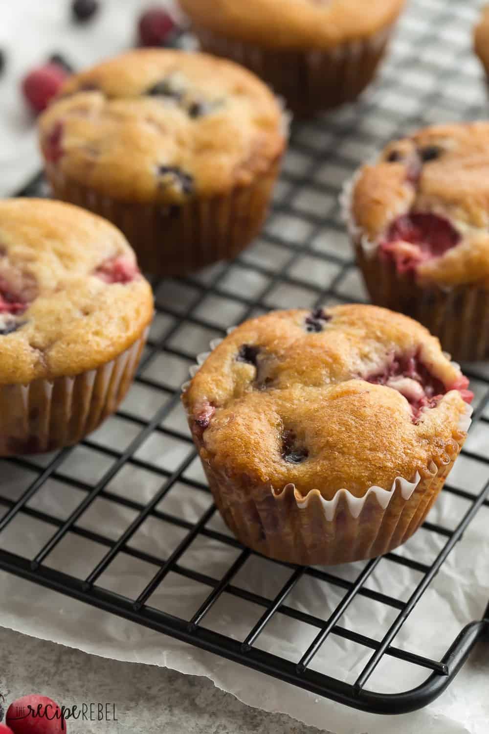 These Fruit Explosion Muffins on a cooling rack.