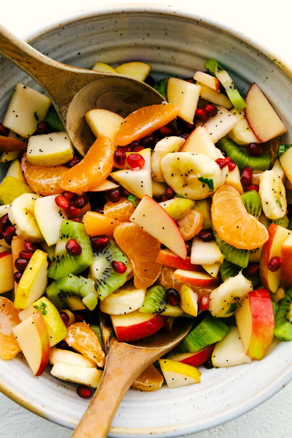 Serving up fruit salad with honey lime dressing. 