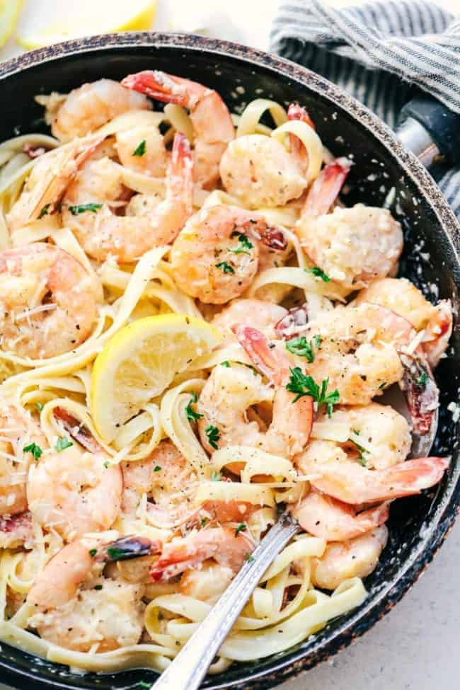 Creamy Parmesan Garlic Shrimp Pasta in a saute pan.