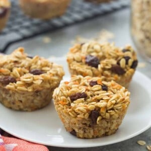 These Carrot Cake Baked Oatmeal Cups are super simple -- a great on the go breakfast, lunch or snack! Packed with fiber and protein and low in calories.