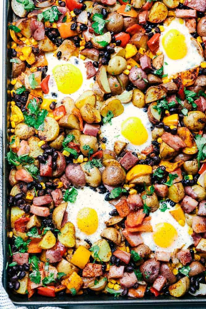 Southwest Baked Ham and Eggs Potato Hash on a baking sheet.