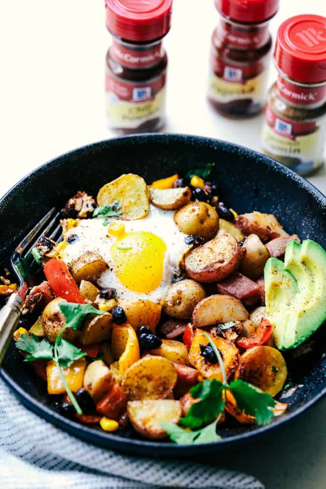 Finished Southwest Baked Ham and Eggs Potato Hash in a skillet.