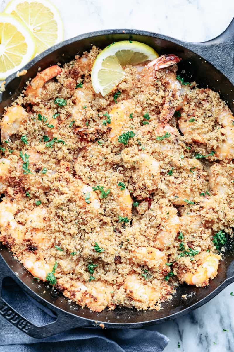 Crunchy Baked Parmesan Garlic Shrimp in a cast iron skillet.