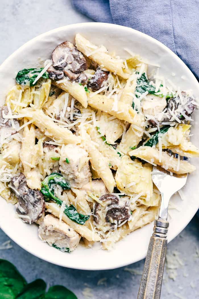 One Pot Creamy Spinach Mushroom Artichoke Chicken in bowl 