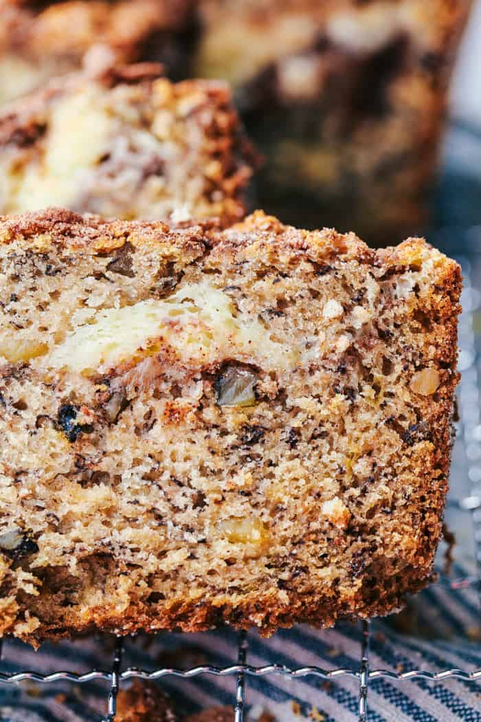 Cinnamon Swirl Cream Cheese Banana Bread slice close up.