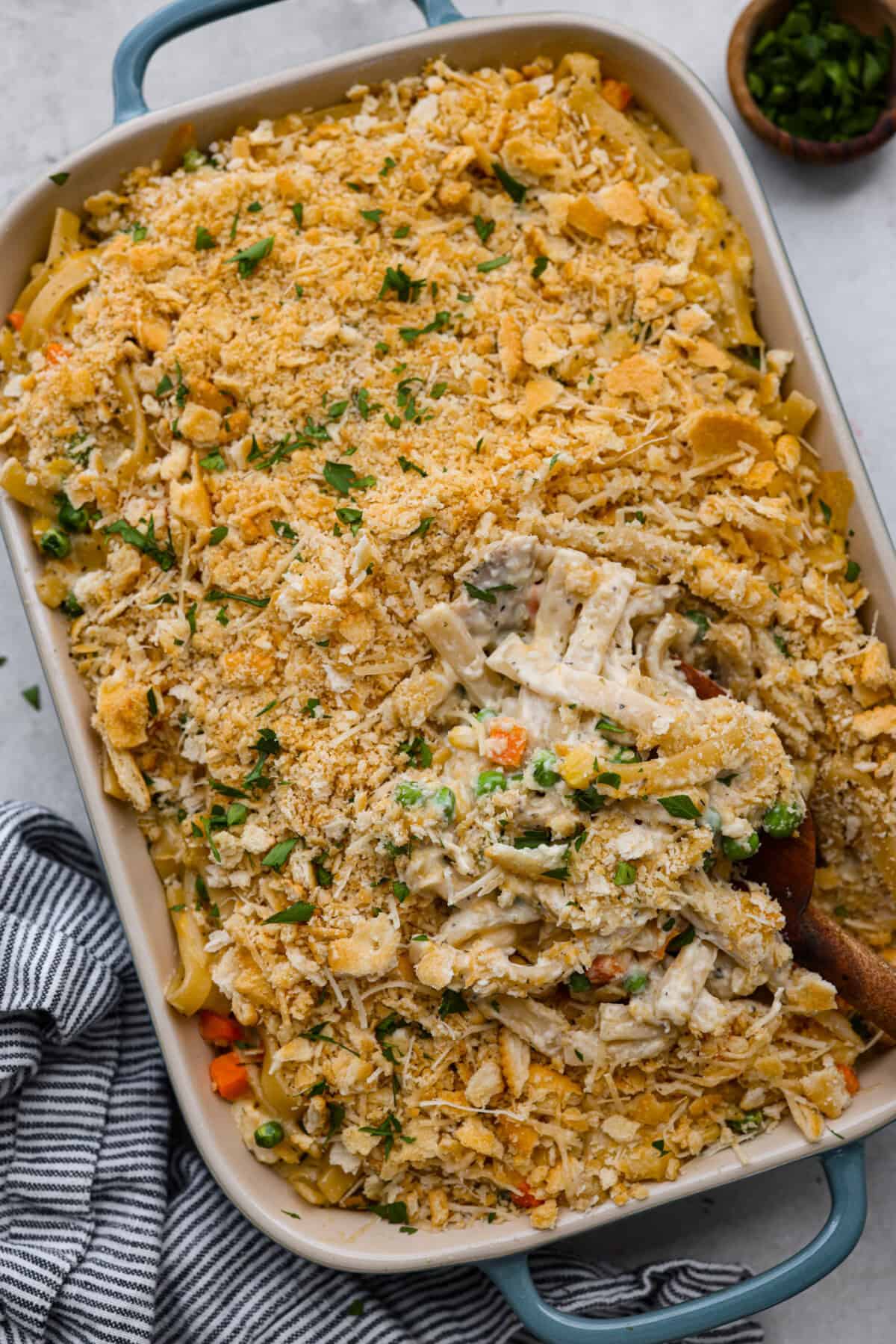 Overhead shot of creamy chicken noodle casserole in a baking dish. 