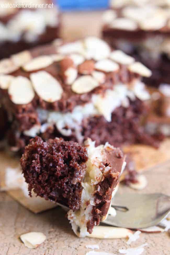 Almond Joy Poke Cake bite on a fork.