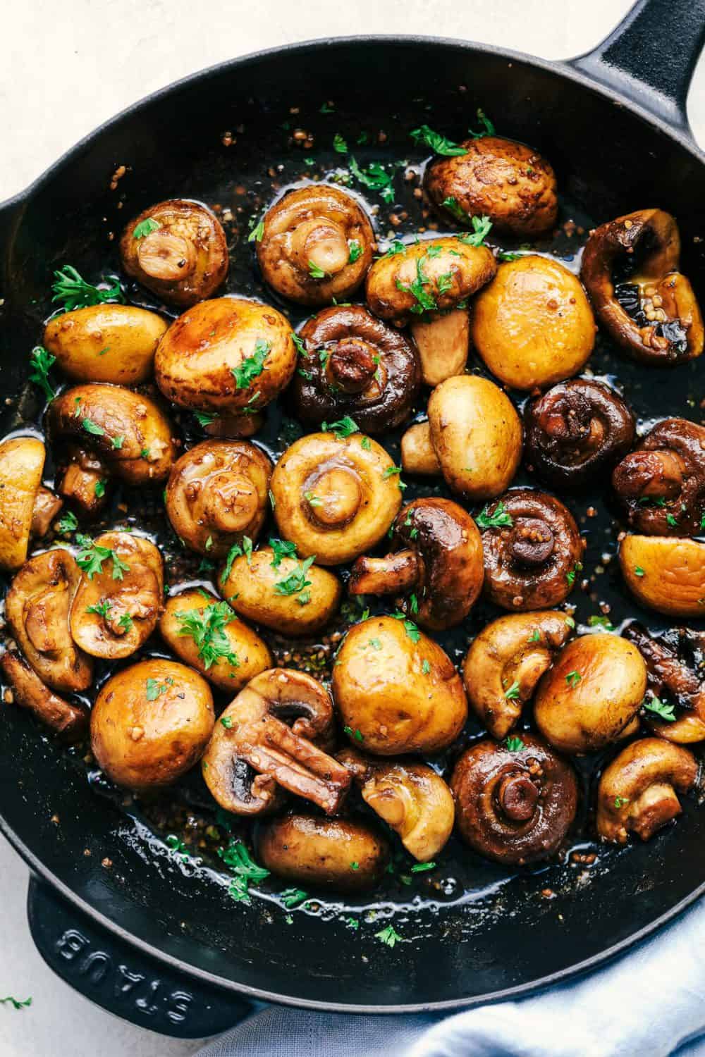 Honey Balsamic Garlic Mushrooms in a black skillet.