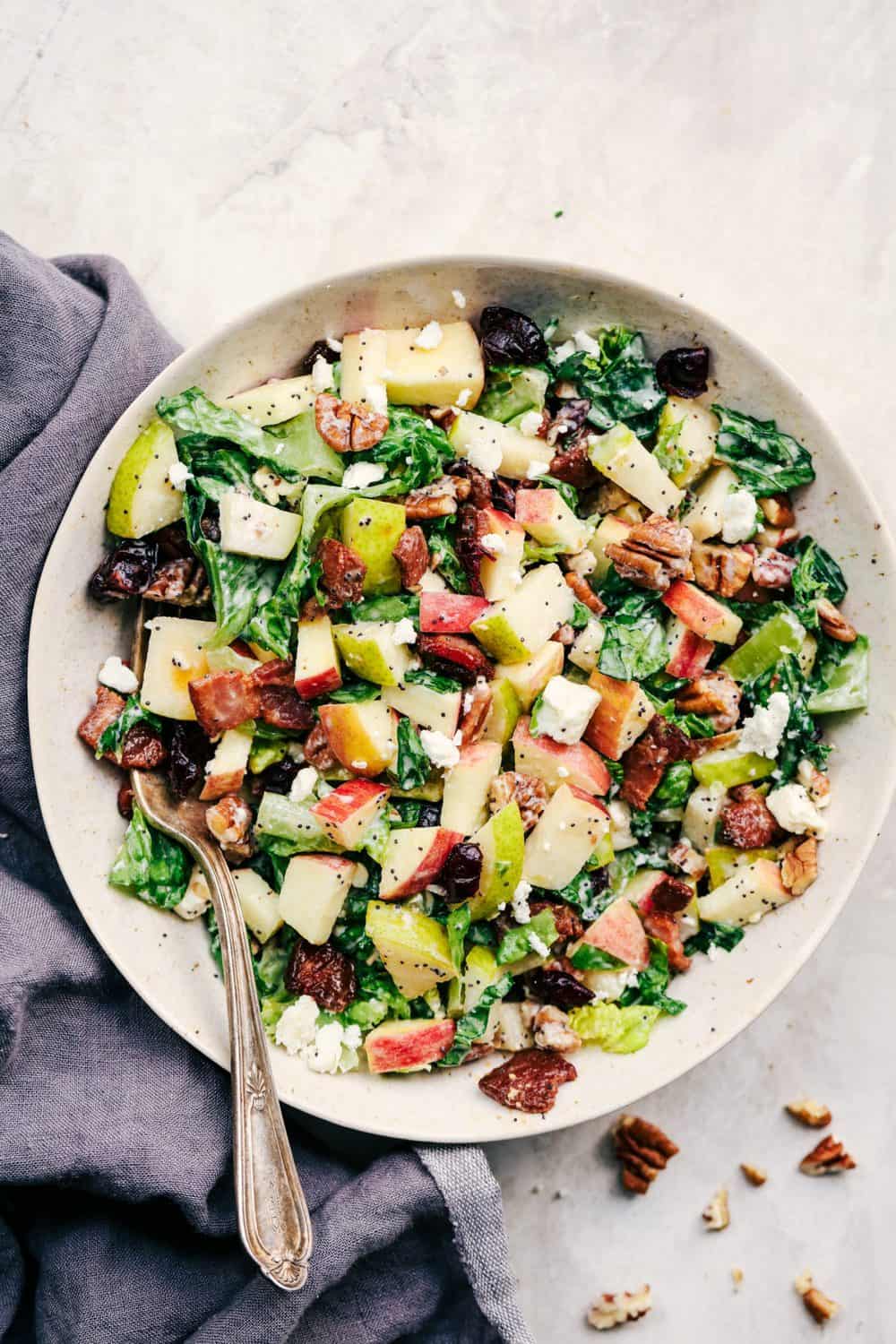 Autumn Chopped Salad with Creamy Poppyseed Dressing in a white bowl.