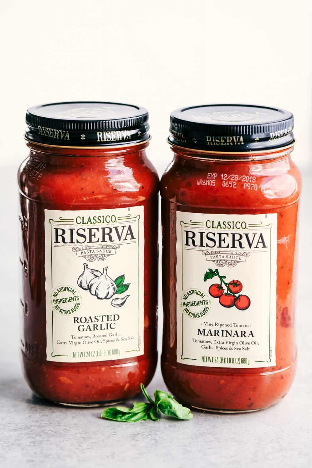 Classico sauce bottles in roasted garlic and marinara.