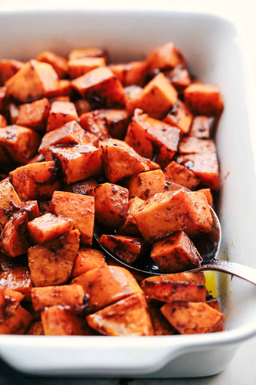 Spoonful of Roasted Honey Cinnamon Butter Sweet Potatoes.