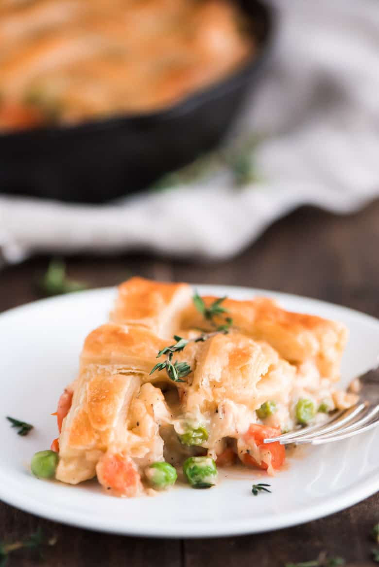 One Skillet Chicken Pot Pie slice on a white plate.