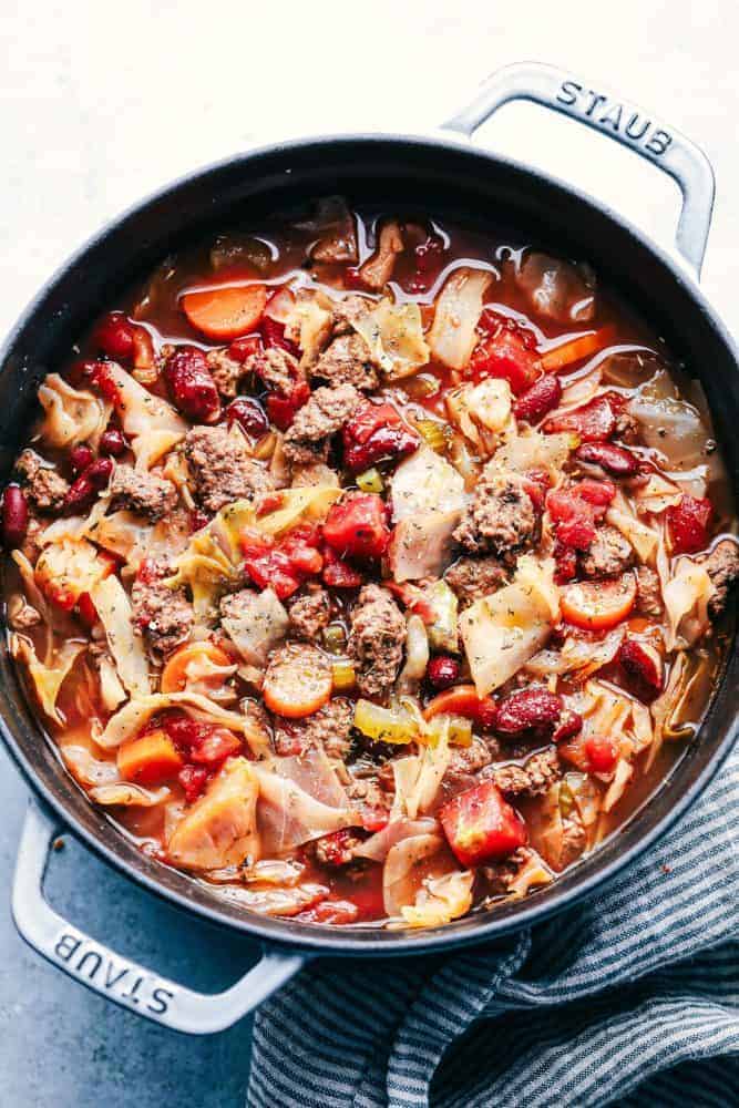 Beef and cabbage soup in a iron pot.