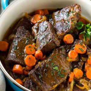 These fork tender root beer glazed short ribs are the perfect meal for a cold winter night. Serve them over mashed potatoes for a dinner that's sure to earn rave reviews from family and friends!