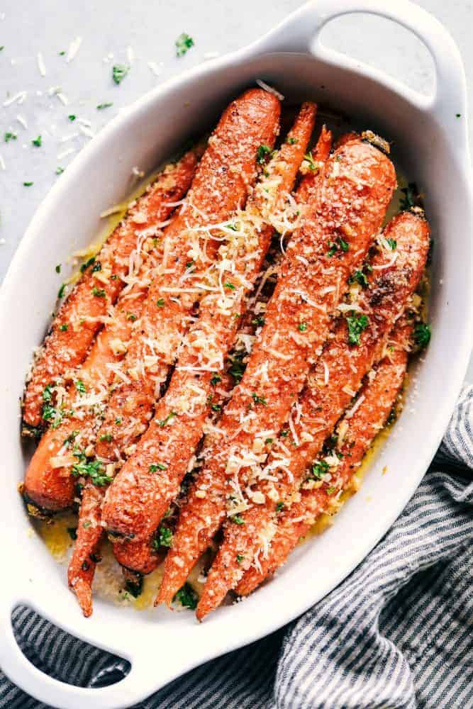 Garlic Butter Parmesan Carrots in a white dish.