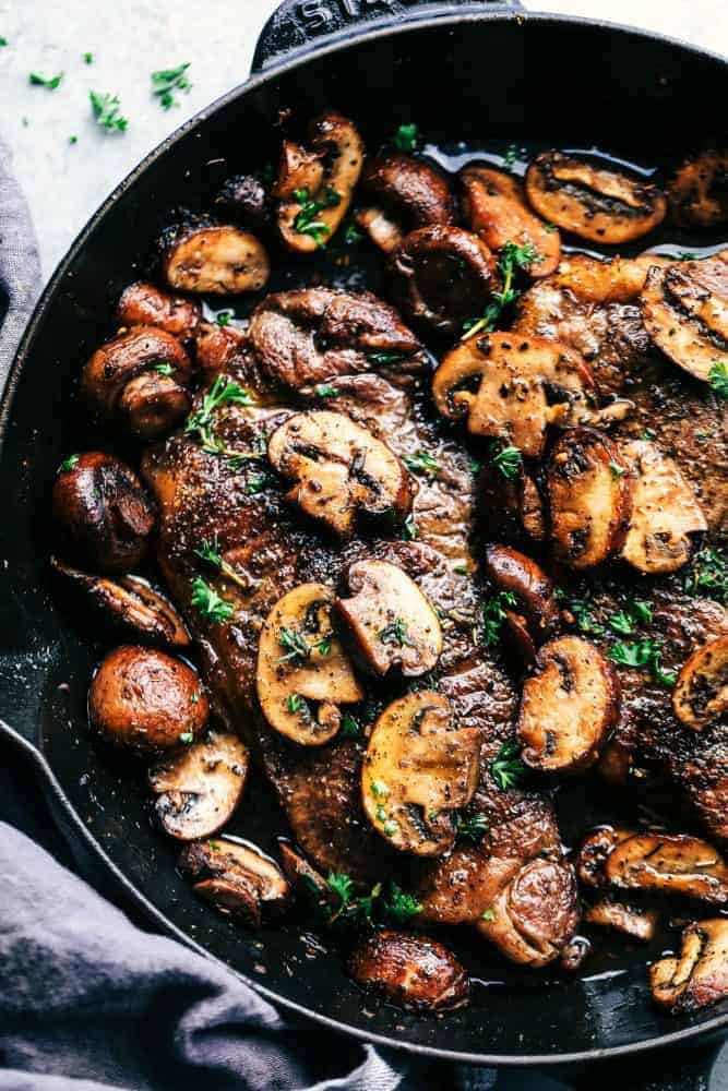 Garlic Butter Herb Steak and Mushroom in a skillet.