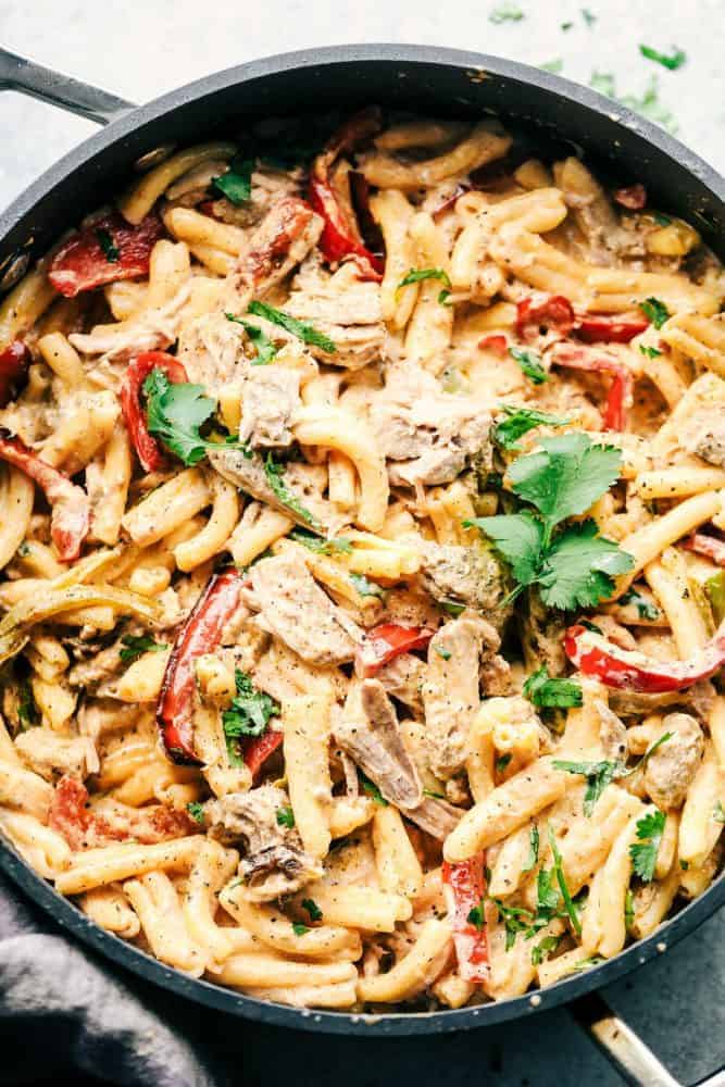 Creamy Pork Carnitas Pasta in a skillet. 