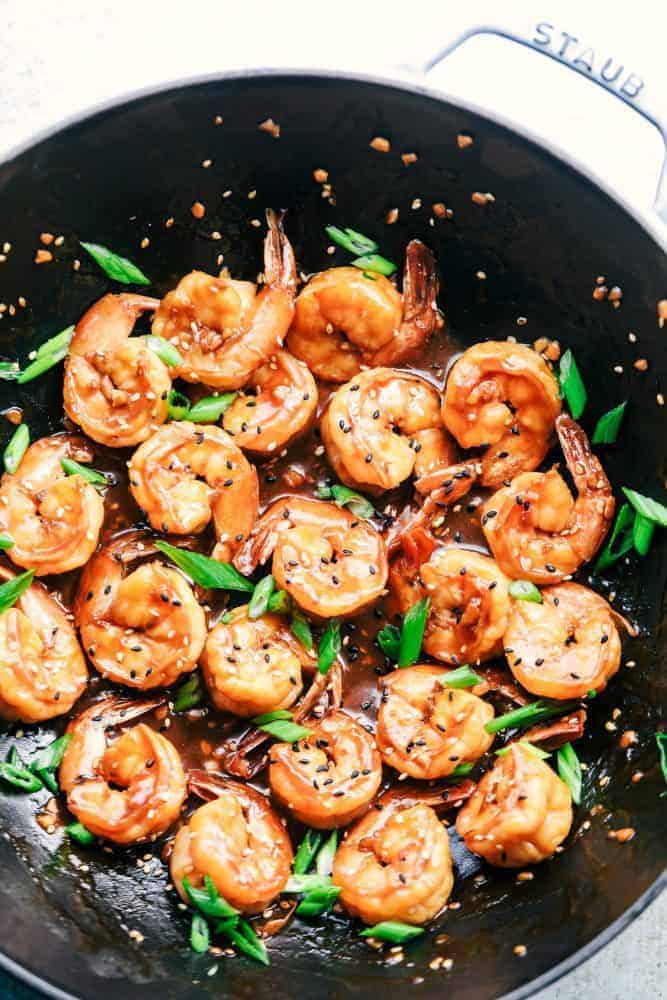 Sticky Sesame Garlic Shrimp in a skillet. 