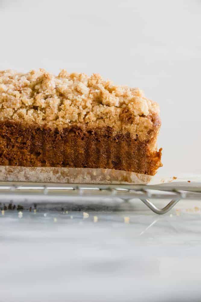 Banana Bread Crumb Cake on a cooling rack. 