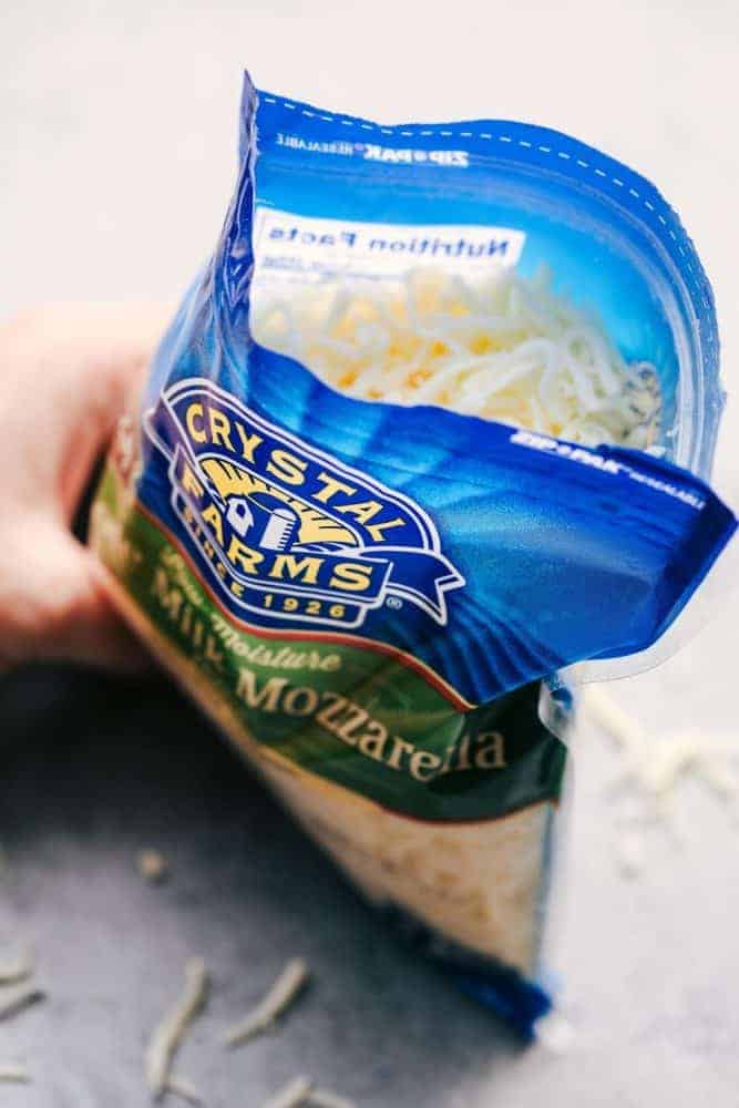 Opened bag of Crystal Farms Whole Milk Mozzarella Cheese. 