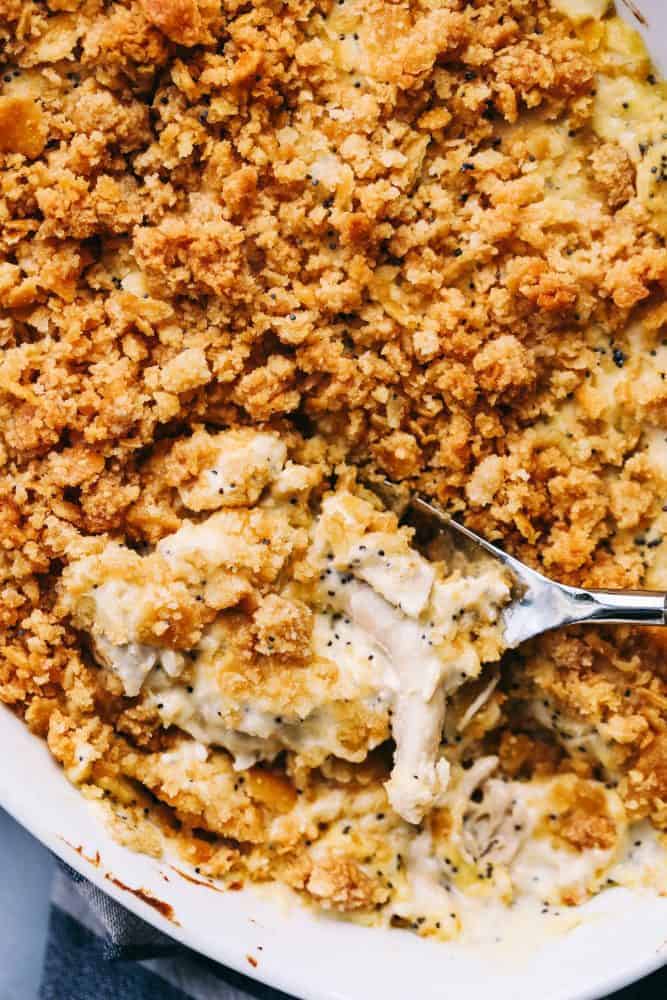 Close up of Poppyseed Chicken Casserole in a white platter. 