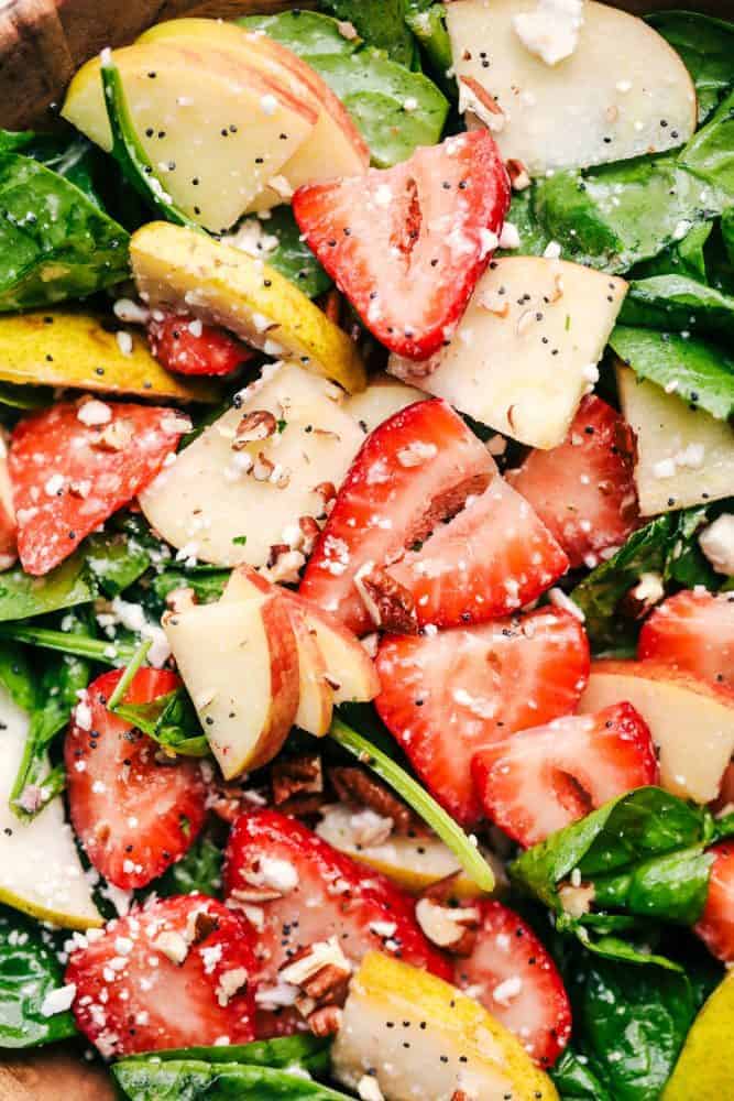 Close up of Strawberry, Apple, and Pear Spinach Salad. 