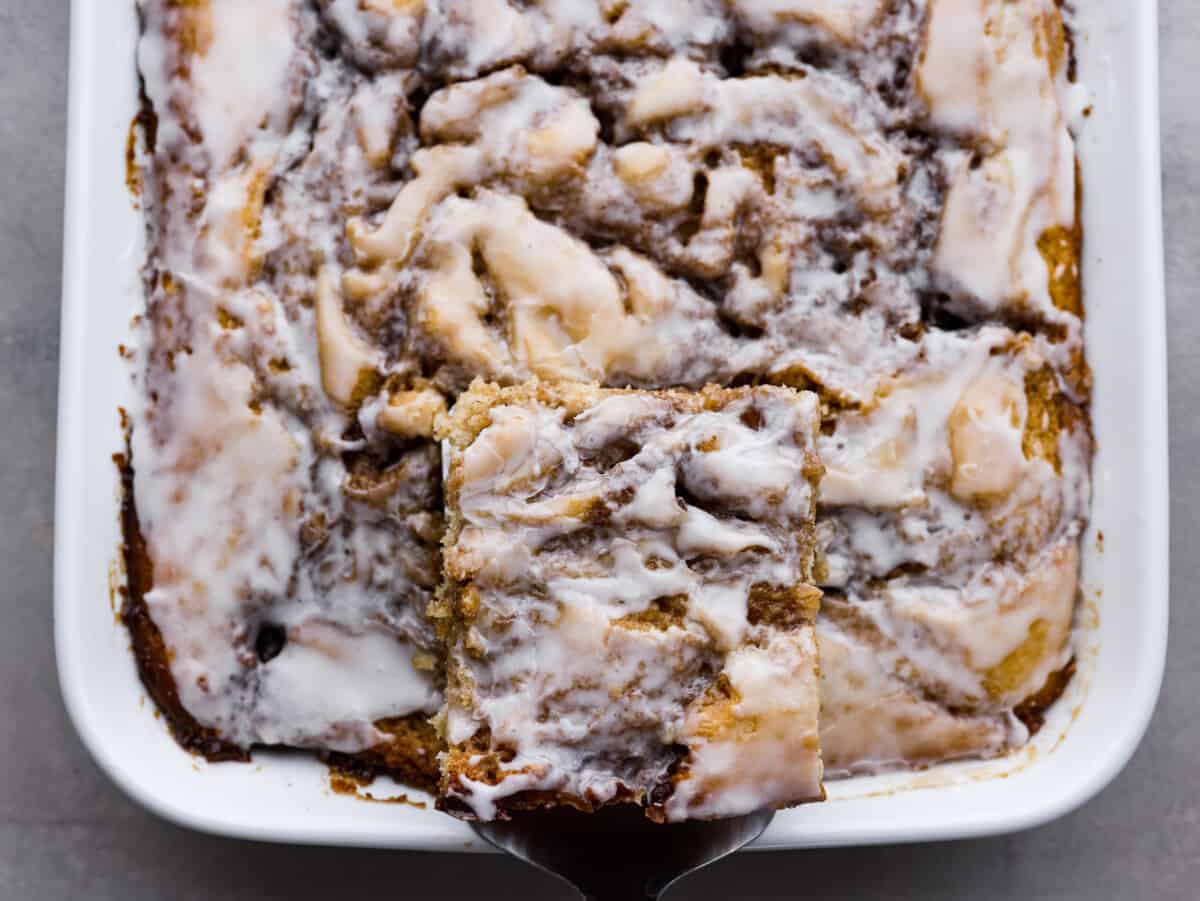 Top-down view of a slice of cake being lifted from the pan.