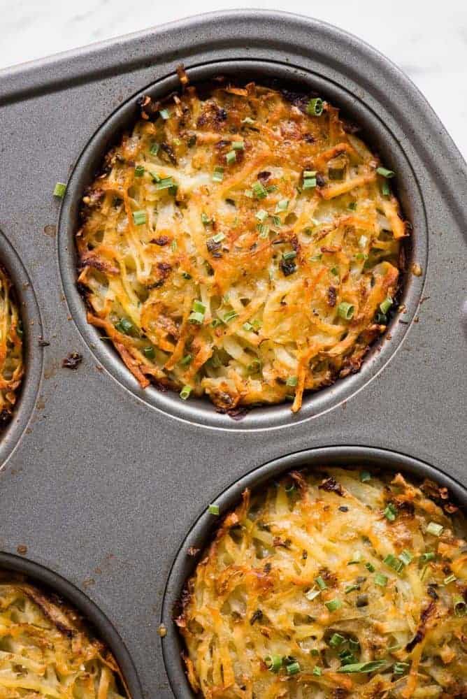 Baked Parmesan Hashbrowns in a muffin baking pan. 