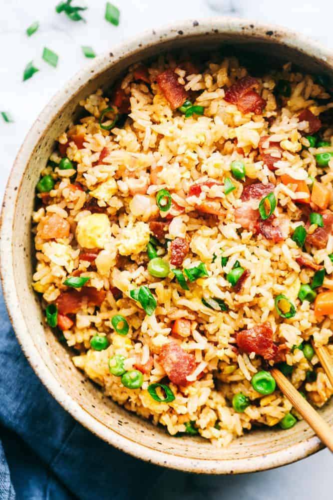 Bacon Fried Rice in a serving bowl with chop sticks. 