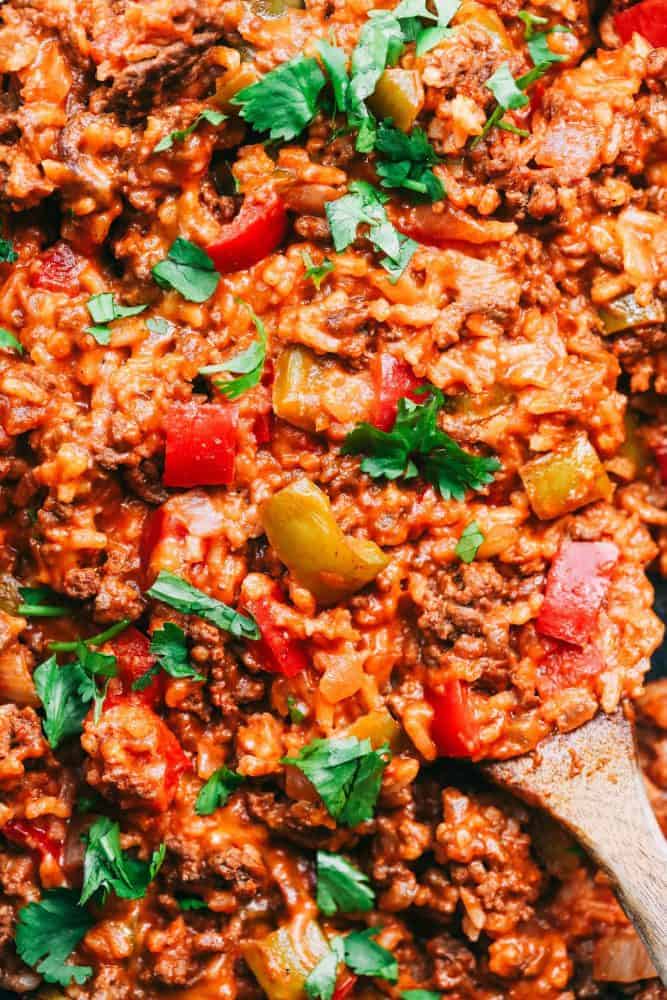 Unstuffed Pepper Skillet with a wooden spoon. 