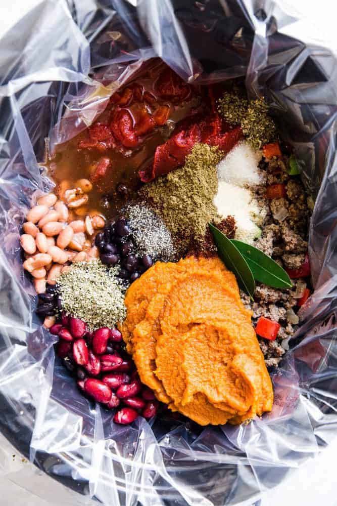 All of the ingredients for slow cooker pumpkin chili with a Reynolds Slow cooker liner.