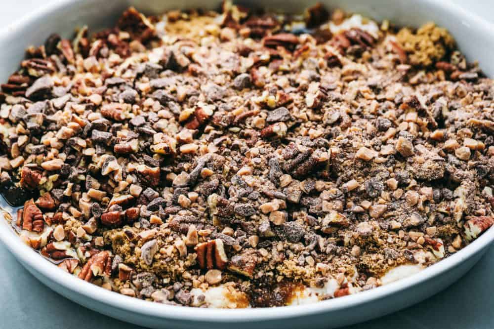 Pecan Pice Cobbler in a white dish. 