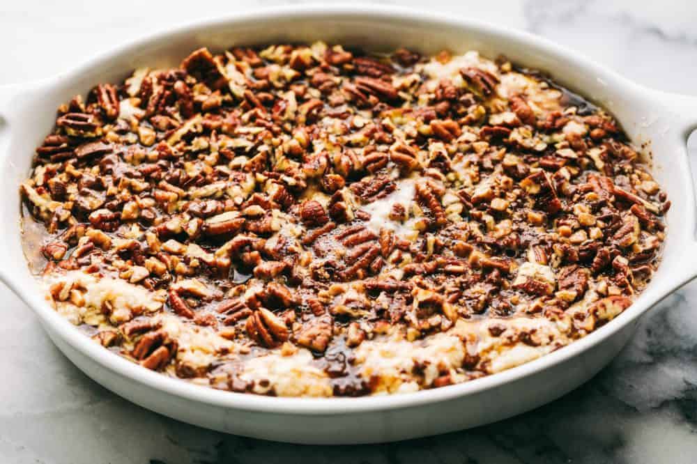 Pecan Pie Cobbler in a white dish. 