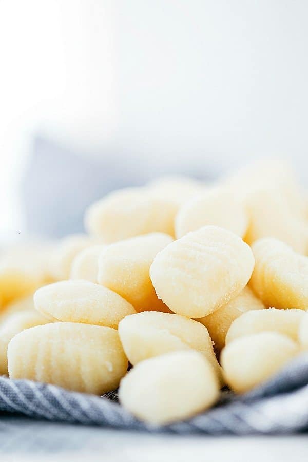 A photo with gnocchi stacked on top of each other.