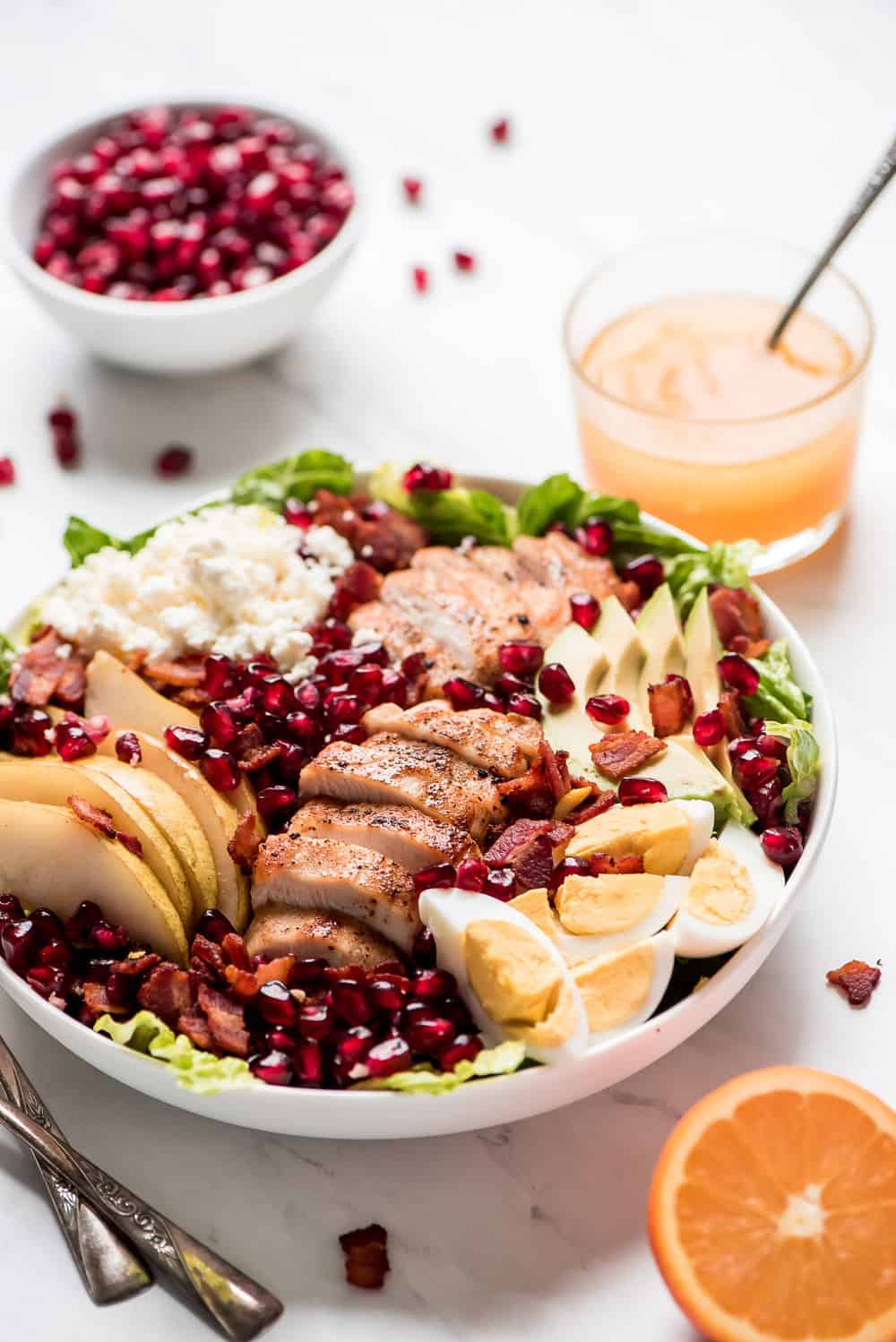 Winter cobb salad in a white bowl.