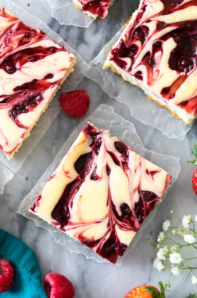 Overhead view of the swirls in berry swirl cheesecake bars