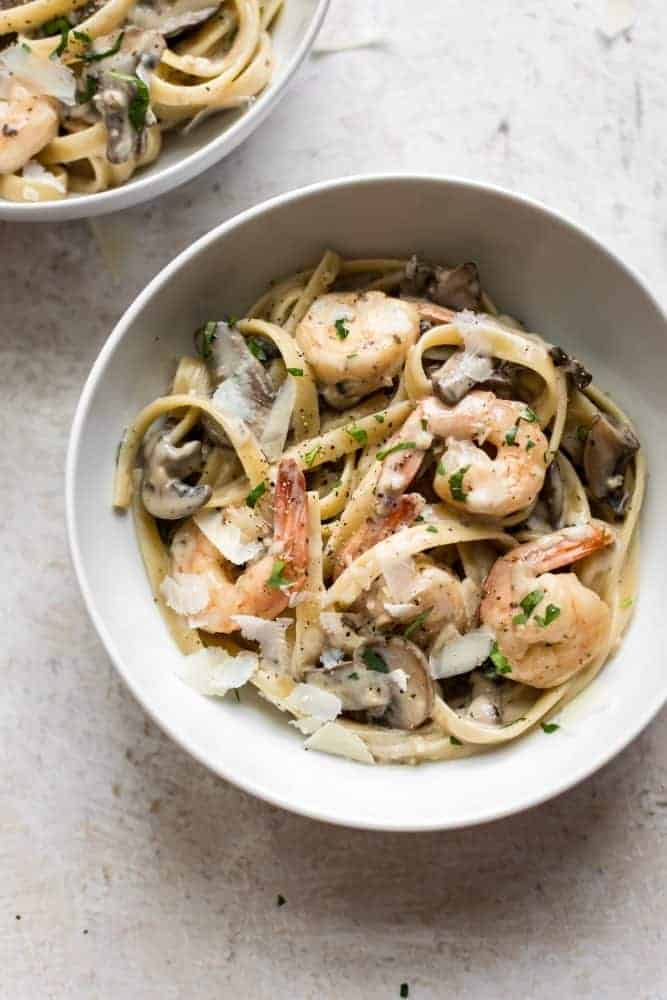 Creamy Shrimp and Mushroom Pasta in a white bowl.