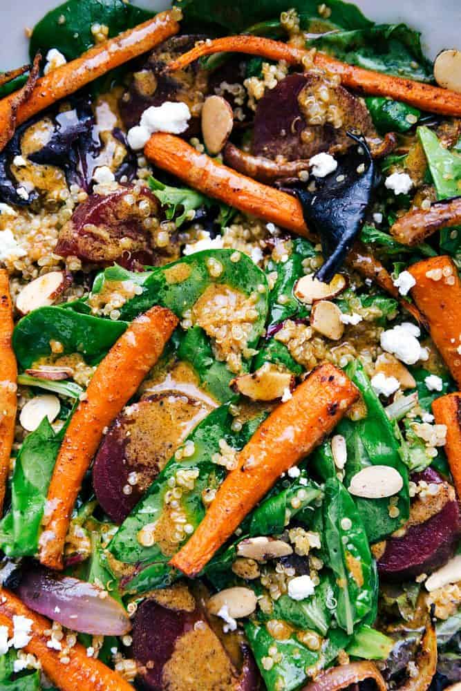 This roasted beet, quinoa, and carrot salad close up.