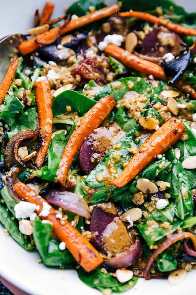 This roasted beet, quinoa, and carrot salad close up.