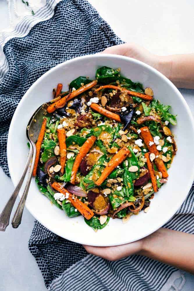 This roasted beet, quinoa, and carrot salad in a bowl.