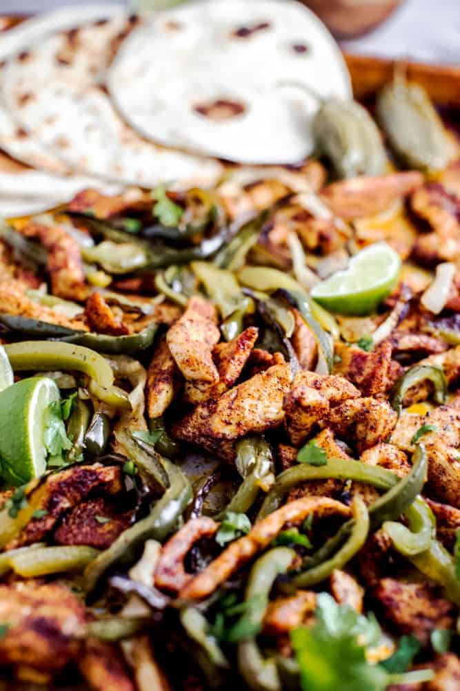 Sheet Pan Salsa Verde Chicken Fajita cooked ingredients up close.